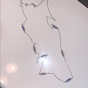 Gold necklace with blue beads